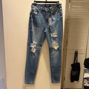 Distressed Blue Jeans